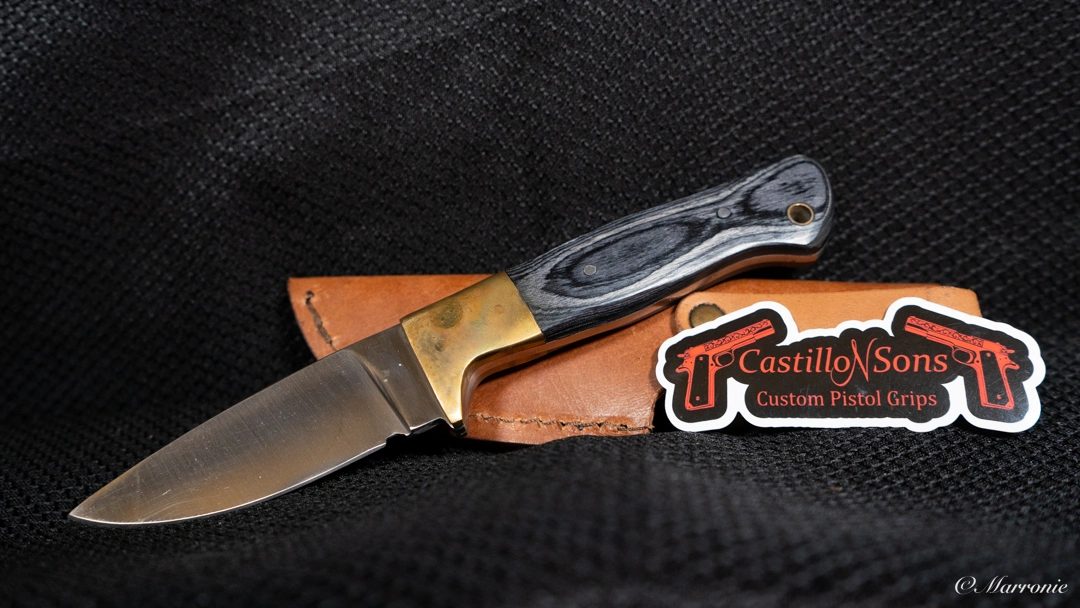 Custom engraved short blade with decorative metalwork