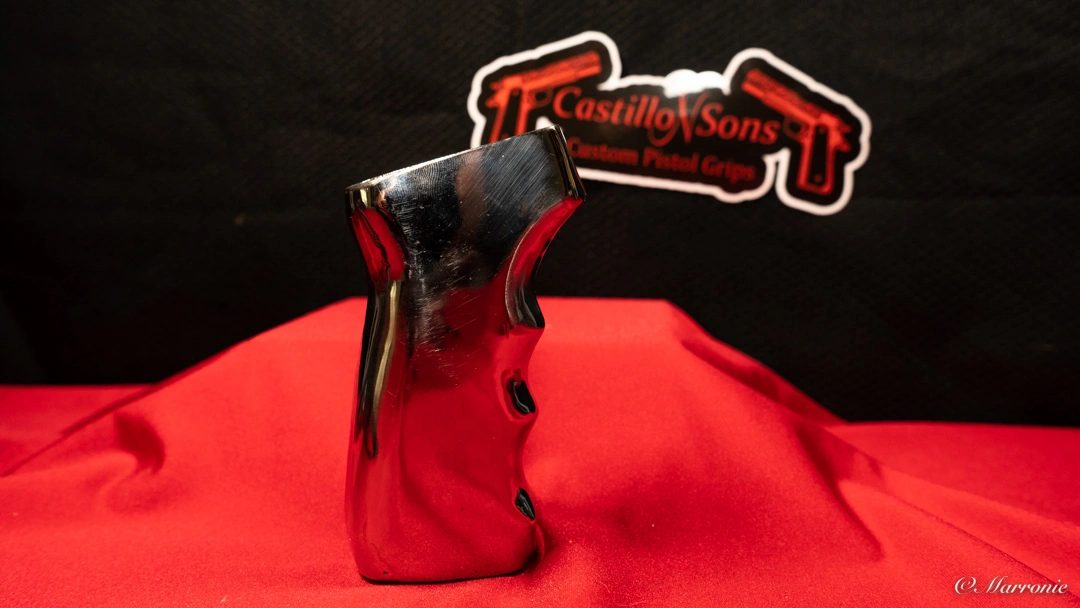 Custom engraved AK grip with detailed scrollwork